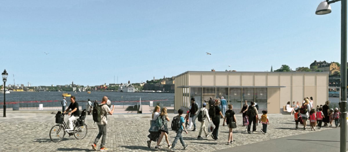 Illustrationsbild: En grupp m&auml;nniskor som g&aring;r p&aring; en trottoar intill nya f&auml;rjeterminalen i p&aring; Skeppsbron.