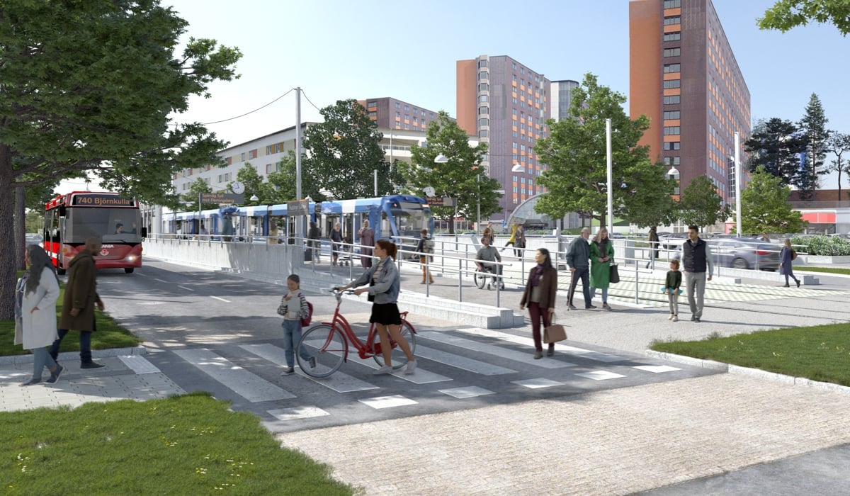 En visionsbild på en spårvägslinje i en urban miljö.