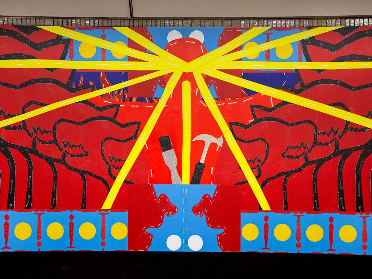 Närbild av målning i starka färger.