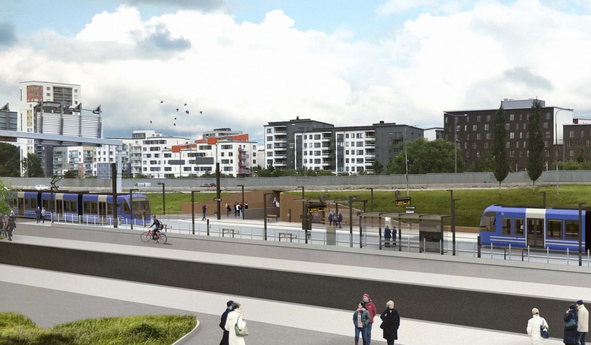 En grupp människor som står på trottoaren bredvid en spårvagn.