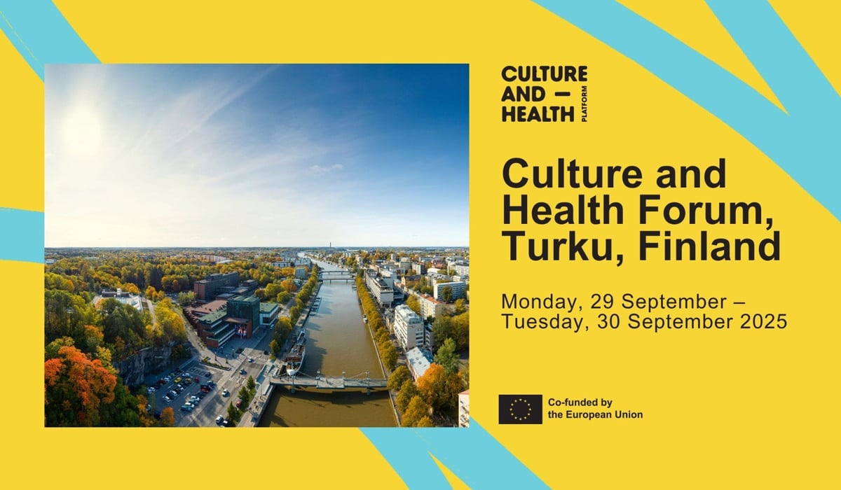 En flygbild av en stad med en flod som rinner genom den. Text med detaljer om konferens i Finland 29-30 september 2025.