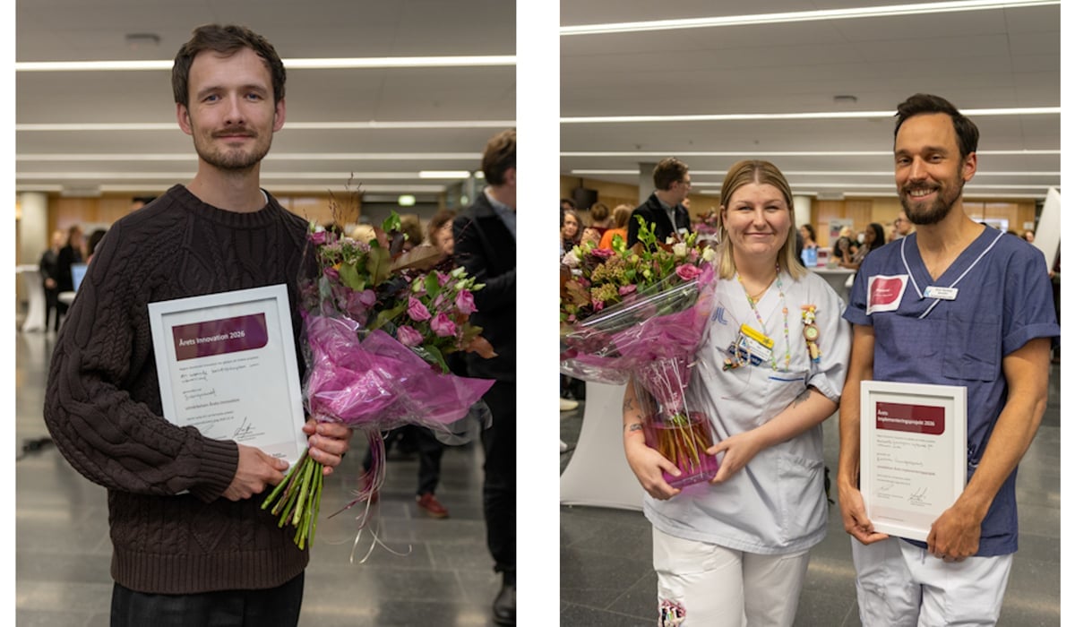 Några personer som står bredvid varandra och håller blommor i händerna.